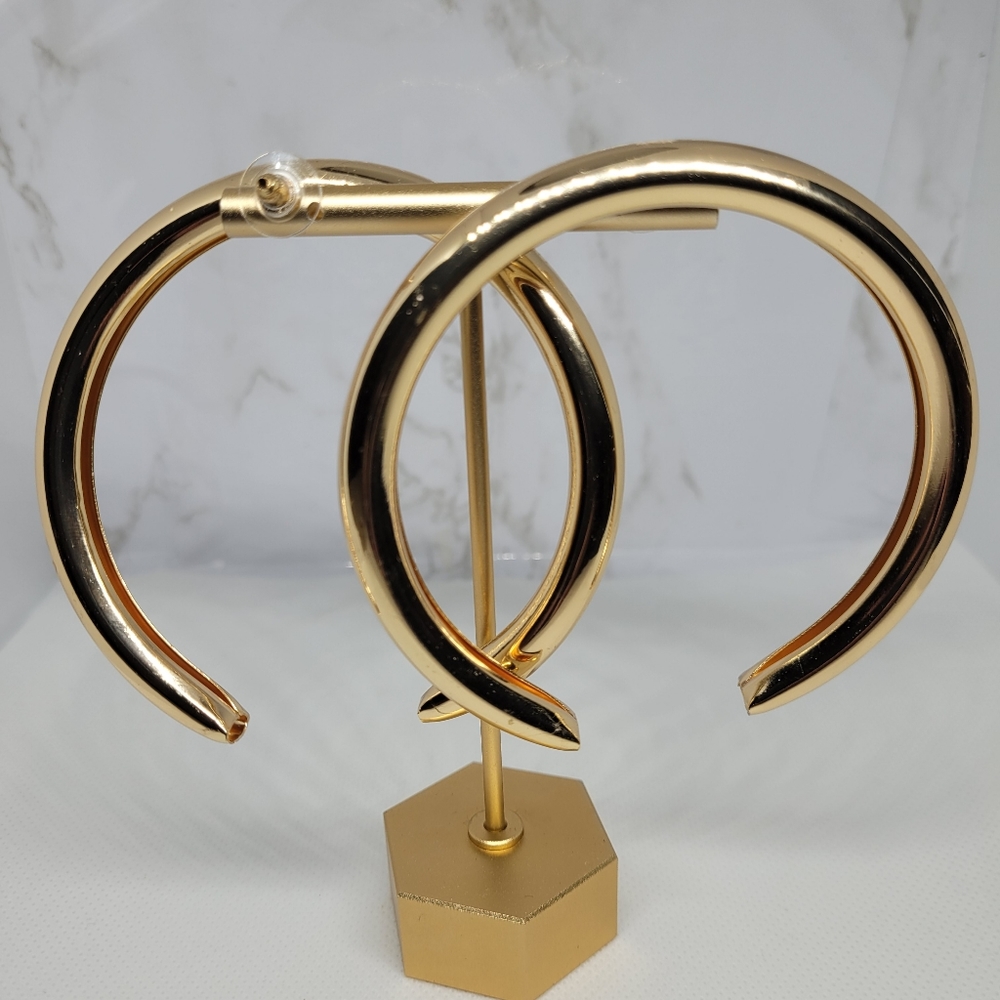 "Arch your back" earrings